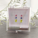 Lot de pierres calibrées (Tourmaline jaune, Tourmaline rose et Tanzanite)