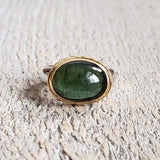 Ring with green tourmaline made with 925 silver and 22 kt gold