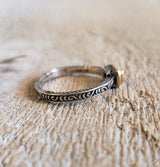 Ring with a pink tourmaline made with 925 silver and 18 kt gold