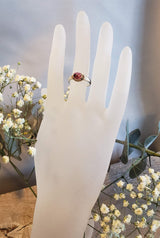 Ring with a pink tourmaline cabochon made with 925 silver and 22 kt gold