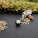 Tahitian pearl, button