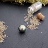 Tahitian pearl, button