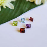 Lot: Garnet, Rhodolite Garnet, Amethyst, Sky blue Topaz and Peridot