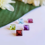 Lot: Garnet, Rhodolite Garnet, Amethyst, Sky blue Topaz and Peridot