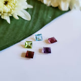 Lot: Garnet, Rhodolite Garnet, Amethyst, Sky blue Topaz and Peridot