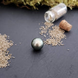 Tahitian pearl, button